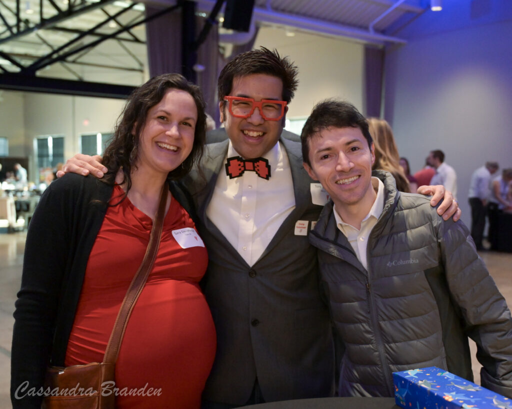 Three benefit guests smiling