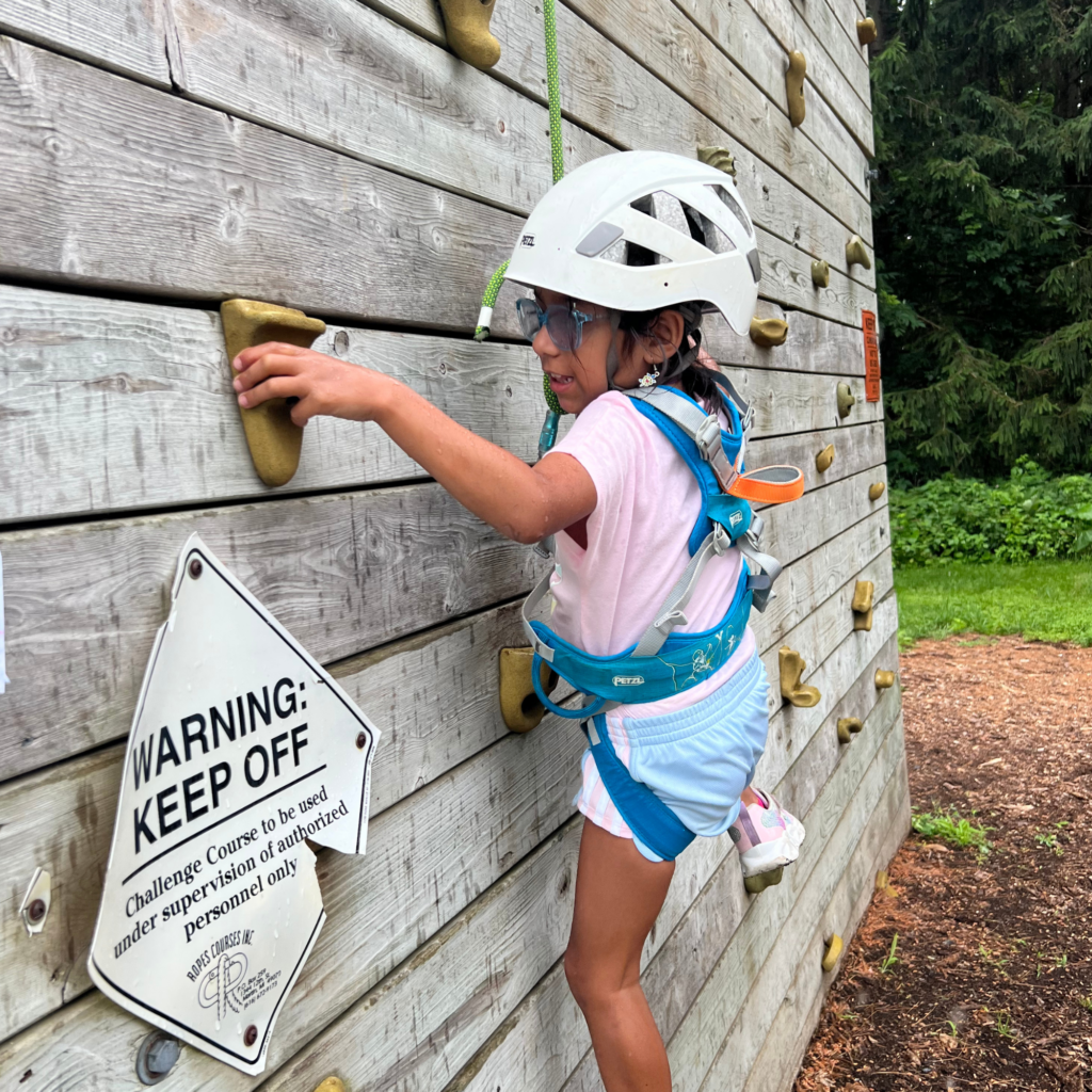 Camper on a climbing wall