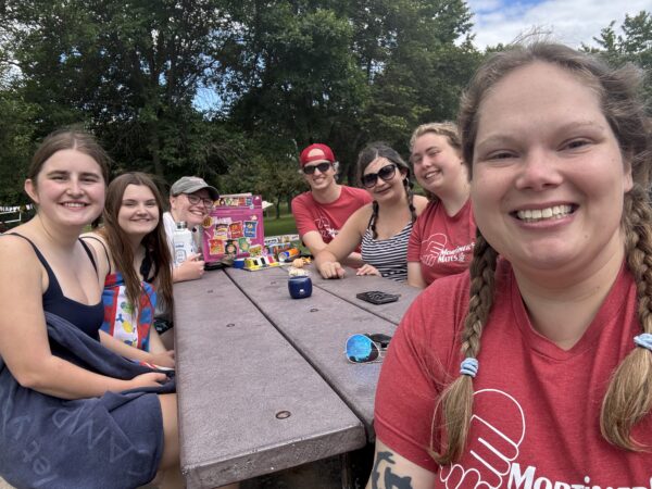 Mortimer's Mates members around a picnic table